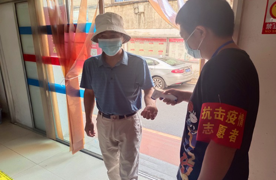资兴唐洞街道大学生志愿者助力疫情防控
